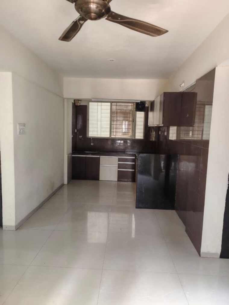 Kitchen, sukhwani-elmwoods 2 Bedroom 950 Sq.Ft. Apartment In Pimple Saudagar Pune 10380501