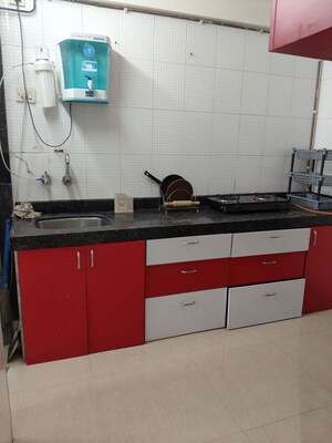 Kitchen in 1 BHK Apartment at Elite Homes, Kharghar Sector 35e – for Rent