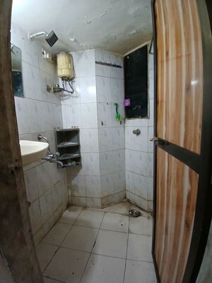 Bathroom in 2 BHK Apartment at Shivner Plaza CHS, Sanpada – for Rent