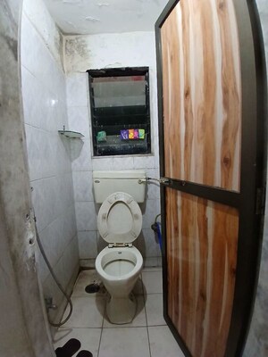Bathroom in 2 BHK Apartment at Shivner Plaza CHS, Sanpada – for Rent