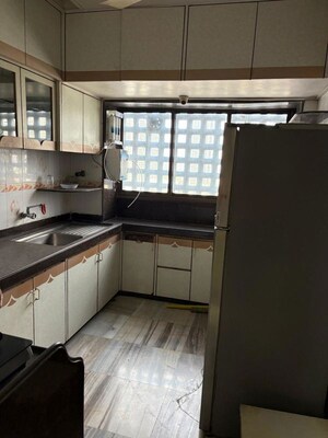 Kitchen in 3 BHK Apartment at Meenakshi Apartment, Goregaon East – for Rent