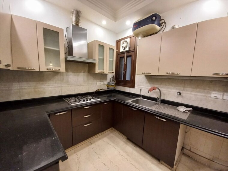 Kitchen, uday park 3 Bedroom 217 Sq.Yd. Builder Floor In Uday Park Delhi 10380653