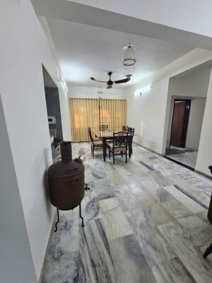 Living Room in 4 BHK Apartment at Race Course – for Rent