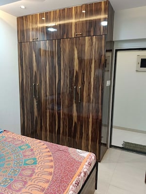 Bedroom in 2 BHK Apartment at Mantri Park, Goregaon East – for Sale