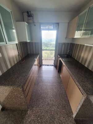 Kitchen in 2 BHK Apartment at Kalpataru Sunrise Grande, Kolshet Road – for Rent