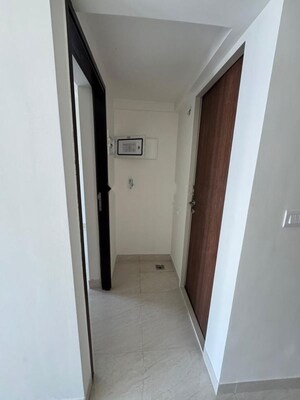 Building Lobby in 2 BHK Apartment at Lodha Quality Home Tower 2, Majiwada – for Rent