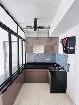 Kitchen in 2 BHK Apartment at Lodha Quality Home Tower 2, Majiwada – for Rent