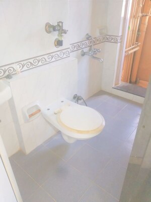 Bathroom in 2 BHK Apartment at K Raheja Palm Spring, Malad West – for Rent