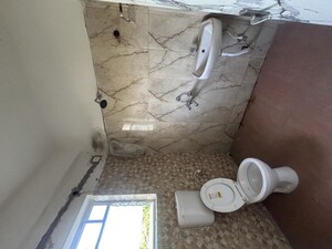 Bathroom in 2 BHK Apartment at Group Uptown One, Behala – for Sale