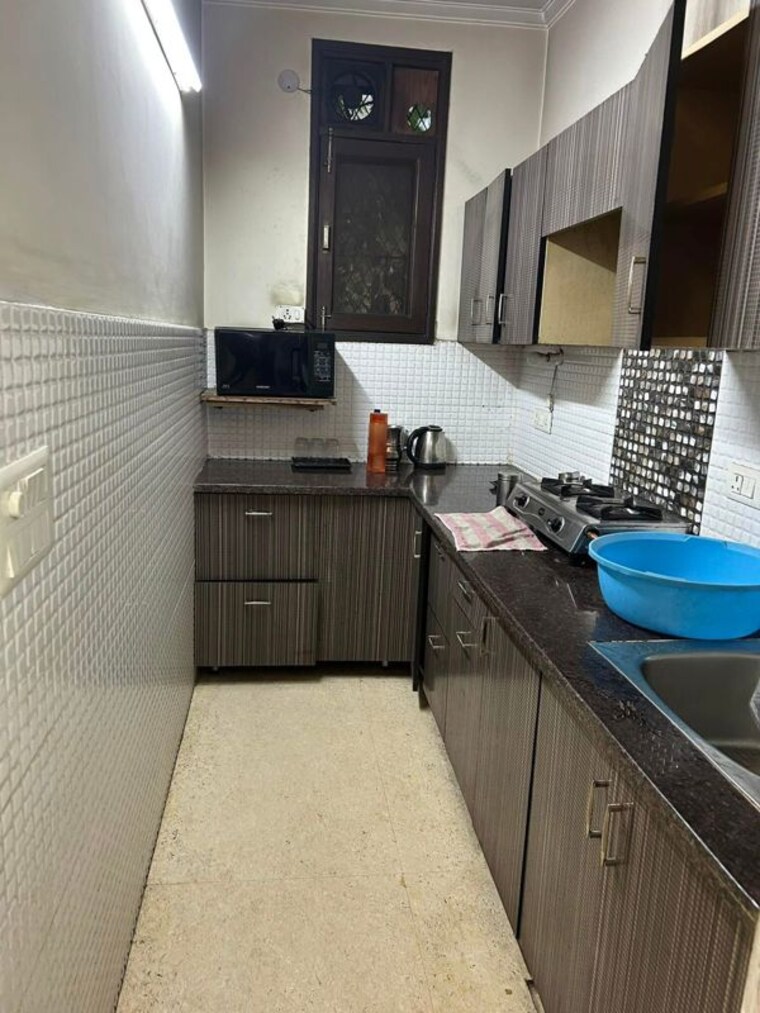 Kitchen, lajpat nagar i 1 Bedroom 900 Sq.Ft. Builder Floor In Lajpat Nagar I Delhi 10381322