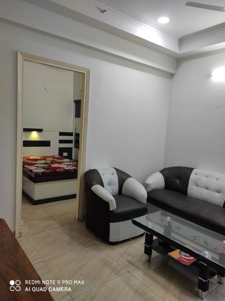 Living Room, gaur-city-2-14th-avenue 2 Bedroom 955 Sq.Ft. Apartment In Sector 16c Greater Noida Greater Noida 10381424