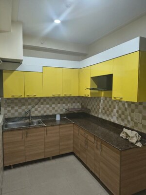 Kitchen in 2 BHK Apartment at Gaur City 2 - 12th Avenue, Sector 16c Greater Noida – for Rent