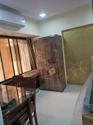 Living Room in 1 BHK Apartment at Naman Premier, Andheri East – for Rent