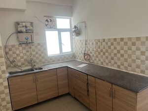 Kitchen in 2 BHK Apartment at Gaur City 5th Avenue, Sector 4 Greater Noida – for Sale