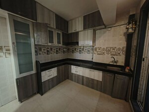 Kitchen in 2 BHK Apartment at Sai Rama The Suits, Kharghar – for Rent