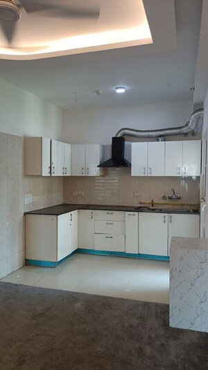 Kitchen in 2 BHK Apartment at Samridhi Luxuriya Avenue, Sector 150 – for Rent