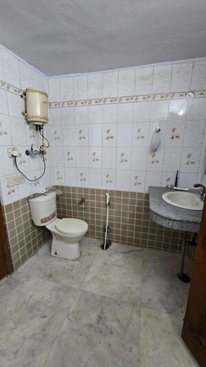 Bathroom in 1 BHK Independent House at RWA Apartments Sector 12, Sector 12 – for Rent