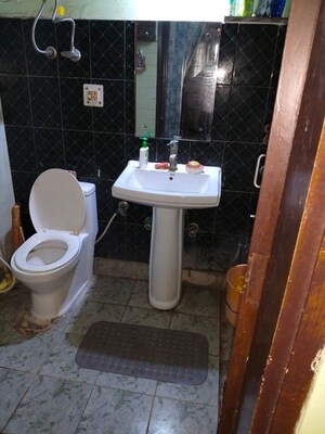 Bathroom in 3 BHK Apartment at Rwa Jalvayu Vihar Noida, Sector 25 – for Sale