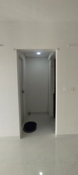 Building Lobby in 2 BHK Apartment at Runwal Gardens, Dombivli East – for Rent