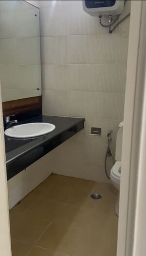 Bathroom in 3 BHK Apartment at Dhoot Time Residency, Sector 63 – for Rent