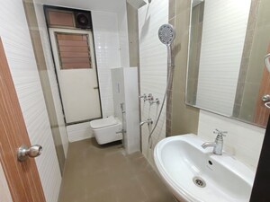 Bathroom in 2 BHK Apartment at Neelkanth Palms Phase 2, Thane West – for Rent