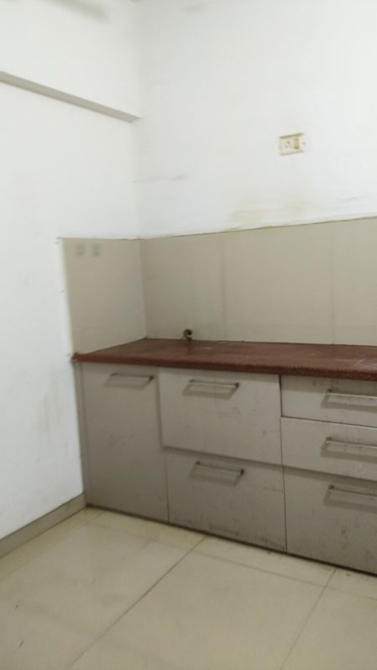 Kitchen, puranik-aldea-anexo 2 Bedroom 1000 Sq.Ft. Apartment In Baner Pune 10381716