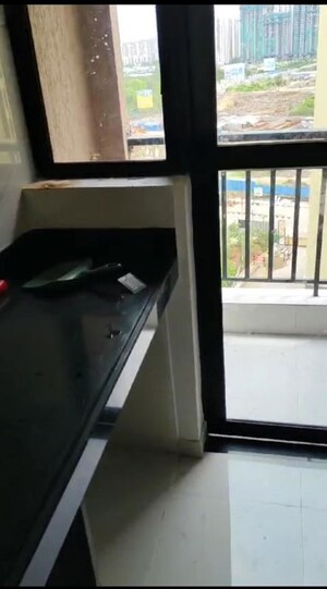 Kitchen in 2 BHK Apartment at Runwal Gardens, Dombivli East – for Rent