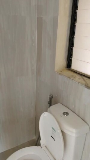 Bathroom in 2 BHK Apartment at Runwal Gardens, Dombivli East – for Rent