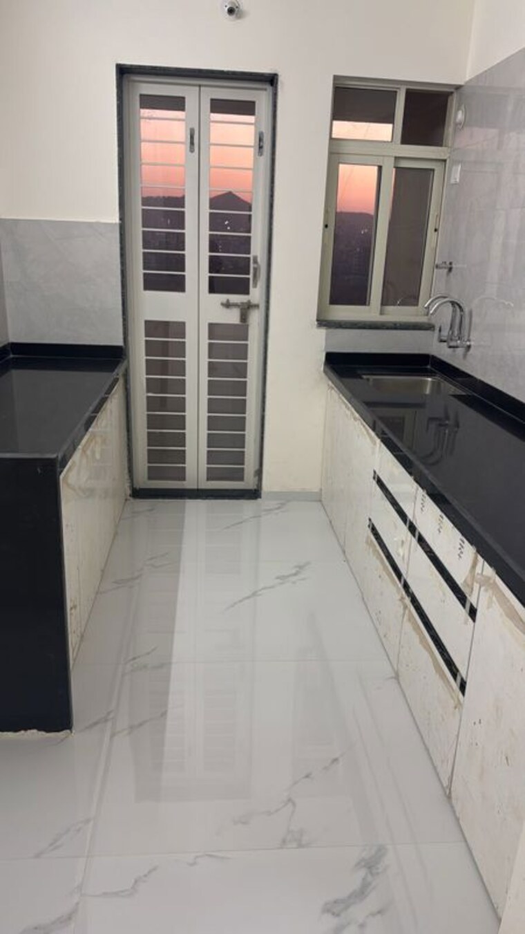 Kitchen, linux-bonheur 3 Bedroom 1200 Sq.Ft. Apartment In Wakad Pune 10381765
