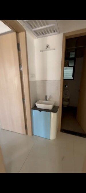 Bathroom in 2 BHK Apartment at Kohinoor Courtyard One, Wakad – for Rent
