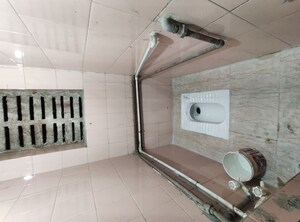 Bathroom in 1 RK Apartment at Maharashtra Co Operative Housing Society – for Rent