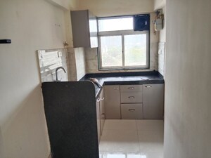 Kitchen in 1 BHK Apartment at Ranka Monalisa Paradise Residency, Dadar East – for Sale