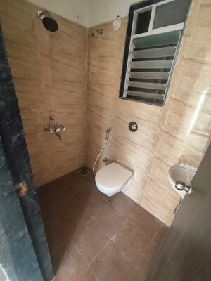Bathroom in 1 BHK Apartment at Nakshatra Metro Majestic, Vartak Nagar – for Sale