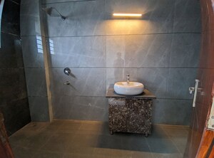Bathroom in 2 BHK Apartment at Eros Brentwood Tower, Charmwood Village – for Rent