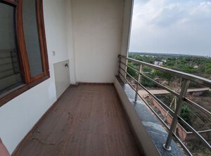 Balcony in 2 BHK Apartment at Eros Brentwood Tower, Charmwood Village – for Rent