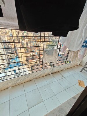 Staircase in 2 BHK Apartment at Darshan Heights, Charni Road – for Sale