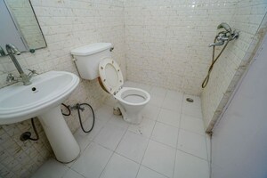 Bathroom in 2.5 BHK Apartment at Gaur City 5th Avenue, Sector 4 Greater Noida – for Sale