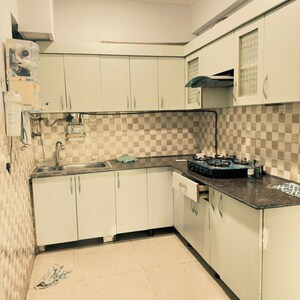 Kitchen in 2 BHK Apartment at Gaur City 2 - 16th Avenue, Sector 16c Greater Noida – for Rent