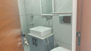 Bathroom in 3 BHK Apartment at Palam Village – for Rent