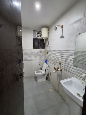 Bathroom in 1 BHK Builder Floor at Chattarpur – for Rent