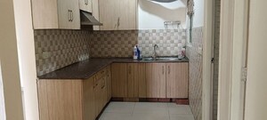 Kitchen in 3 BHK Apartment at Gaur City 2 - 16th Avenue, Sector 16c Greater Noida – for Rent