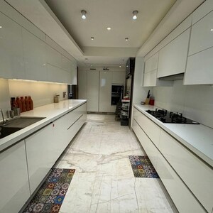 Kitchen in 4 BHK Apartment at Raiaskaran Parthenon, Bhudargarh Colony – for Sale