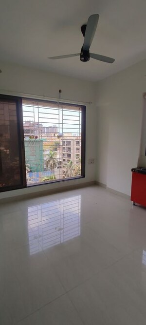 Room in 2 BHK Apartment at Ankur Building, Malad West – for Rent