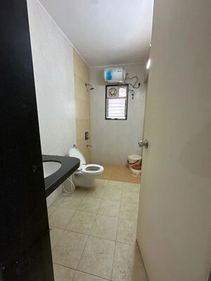 Bathroom in 2 BHK Apartment at Bhaktiyog CHS, Kothrud – for Rent