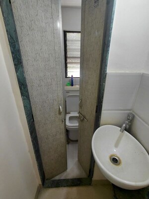 Bathroom in 2 BHK Apartment at Bhaktiyog CHS, Kothrud – for Rent