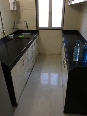 Kitchen in 2 BHK Apartment at Cosmos Classique, Ghodbunder Road – for Rent