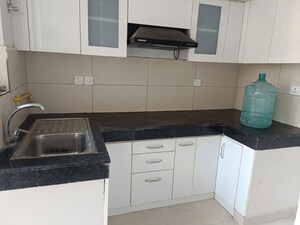 Kitchen in 2 BHK Apartment at Tata Eureka Park, Sector 150 – for Rent