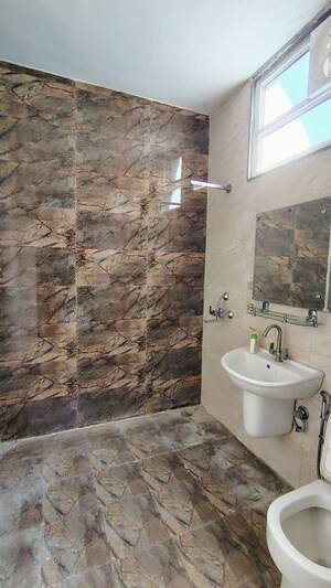 Bathroom in 3 BHK Apartment at Emaar Palm Gardens, Sector 83 – for Sale