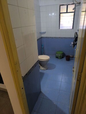 Bathroom in 3 BHK Apartment at Sai Dwarkamai CHS, Kondhwa – for Rent