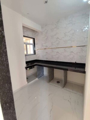Kitchen in 2 BHK Apartment at Aura Luxisca, New Panvel – for Sale